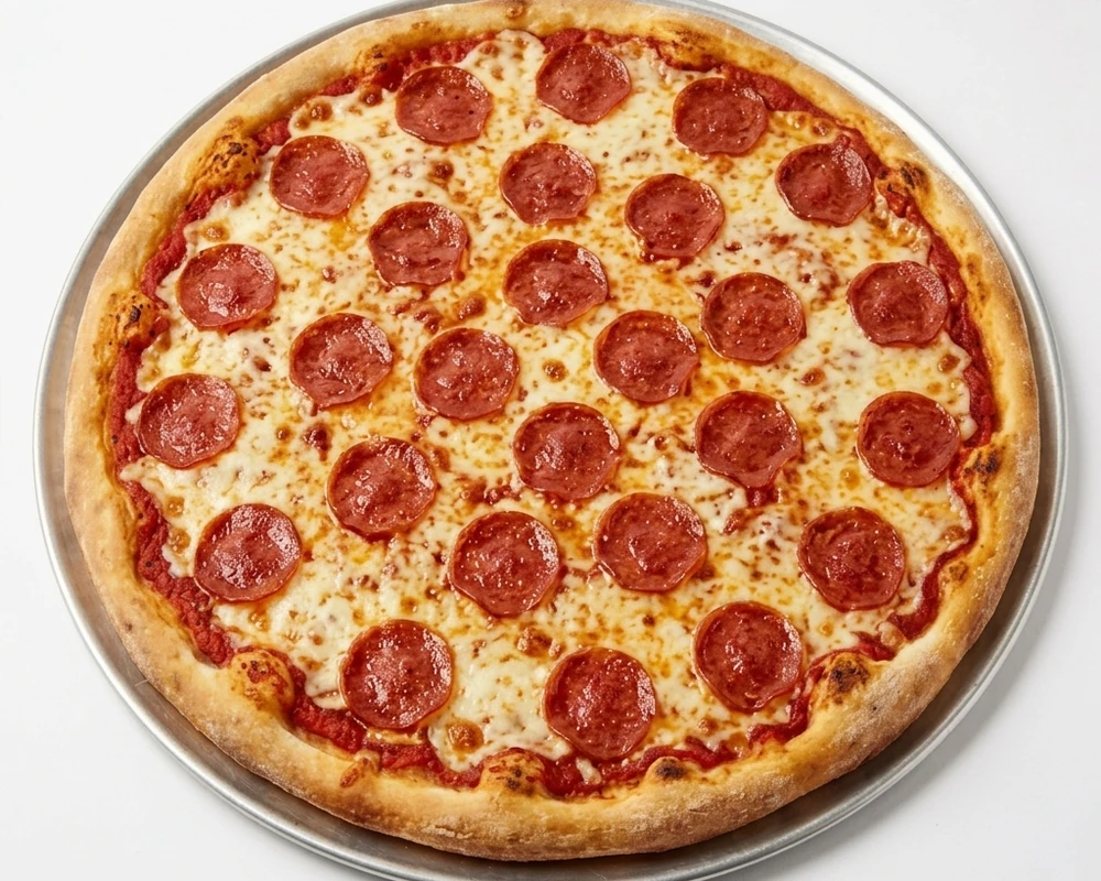 Fresh pizza preparation at Binge Pizza in southeast Calgary